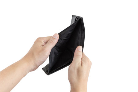 The hand of an Asian merchant with his wallet open is blank on a white background with clipping...