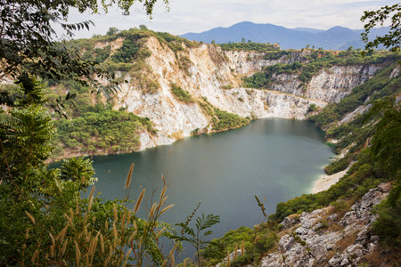 Grand Canyon, a quarry that looks like a rocky mountain with a river in the middle, in Chonburi Province, Thailand.の写真素材