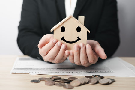 business finance and saving money investment ,businessman hold piggy bank.financial planning concept.Balance savings and investment.Money Saving Ideas for Buying a Home.の写真素材