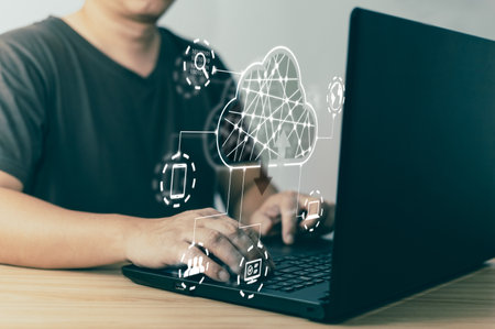 man use laptop and cloud computing diagram show on screen.Data storage.the use of online digital...