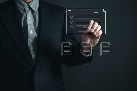 man touch screen to manage data,Document Management System (DMS),knowledge and documentation in...