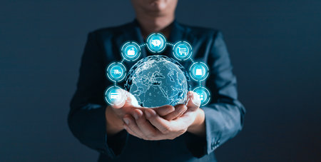 A person holding world and plan in e-business, the use of online digital network technology in...