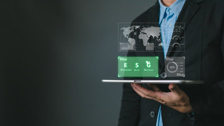 person use software to save energy,and reduce global warming,ecology friendly investment,ESG environment social governance,nature green Business Innovation and Sustainable Development concept.の写真素材