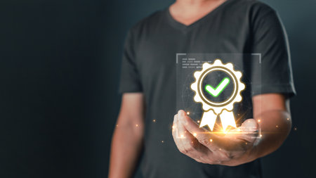 ISO certification, Standards, Guarantee, and standardization concept. person's hand holding and show the sign of the top service best quality.の写真素材