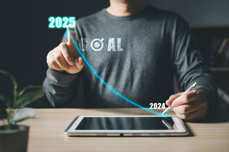 Businessmen touch target 2025 and progress of business and analyze financial, and investment.Use...