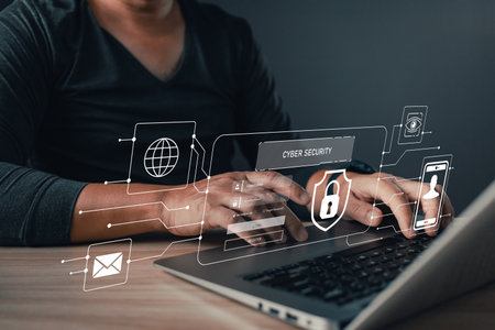 a person navigating cybersecurity systems to secure data, protect sensitive information, and shield digital assets, emphasizing robust measures against cyber threats in the digital realm.の写真素材