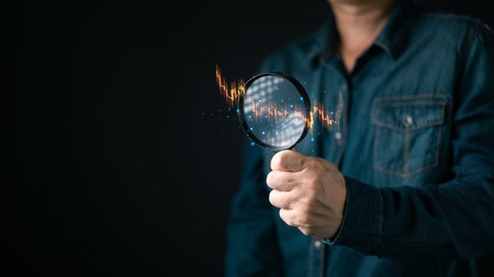 person hold a magnifying glass focused on digital candlestick chart with glowing data...