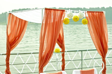 Wedding ceremony in marine style in coral colorの写真素材