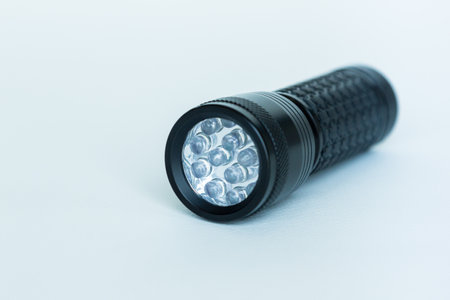 LED Flashlight on white backgroundの写真素材