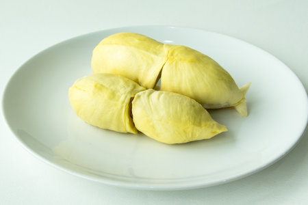 Durian on white dishの写真素材