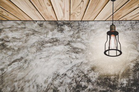 vintage hanging lamp in the room with gray lolf wall concrete texture ,dark toneの写真素材