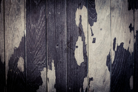 peeling paint on plank wood texture and background, dark toneの写真素材