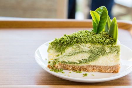 green tea cheese cake dessert on white dish