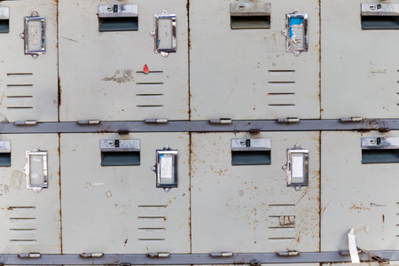 gray rusted old cabinet lockers, close upの写真素材