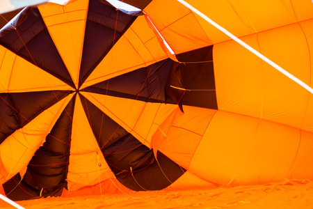 inside of orange and black hot air balloon before flyingの写真素材