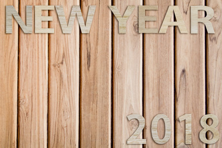 wood letter new year and 2018 on wood backgroundの写真素材