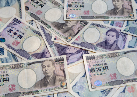 Japanese currency yen bank notes backgroundの写真素材