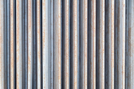 the old rusty folding metal door