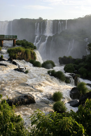 Iguazu Falls is a top tourist destination and UNESCO designated the falls as a World Heritage Area in Brazil, South America.の写真素材