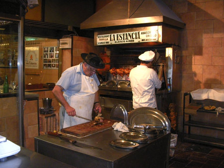 Buenos Aires, Argentina - October 10, 2010: Chefs prepare meats in a typical Argentinean barbecue restaurant in the city of Buenos Aires, Argentina, South America.のeditorial素材