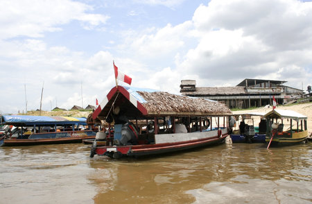 Iquitos, Peru - October 20, 2010: Boats line up on the banks of the Amazon River, awaiting passengers at the port of Iquitos, Peru, South Americaのeditorial素材