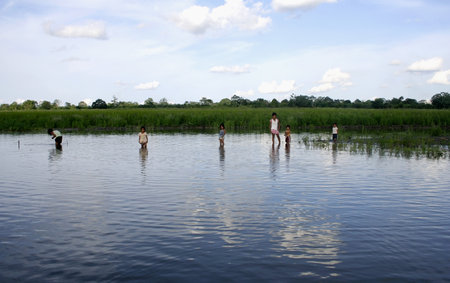 Amazon, Peru - October 21, 2010: Unknown children playing in the Amazon River near Iquitos, Peru, South Americaのeditorial素材