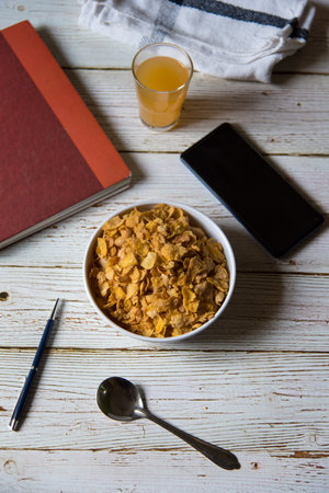 Top view breakfast cereal with fruit juice on a background