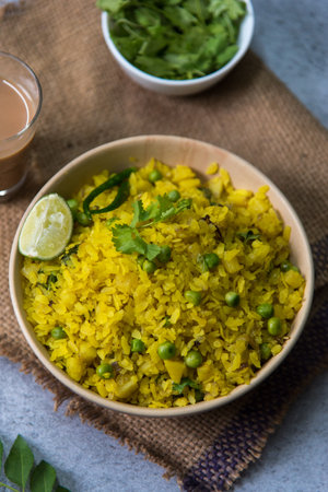 Close up of typical Indian breakfast poha with use of selective focus.の写真素材