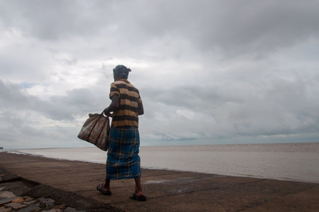 A dark and gloomy autumnal morning at Chandipur, Odisha, Indiaのeditorial素材