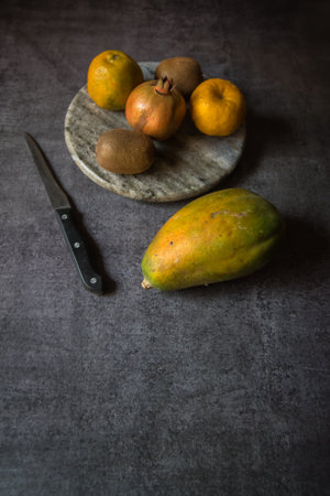 Close up of fresh fruits on a background with use of selective focus.