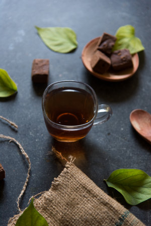 Energy drink black tea served in a cup. Close up.の写真素材