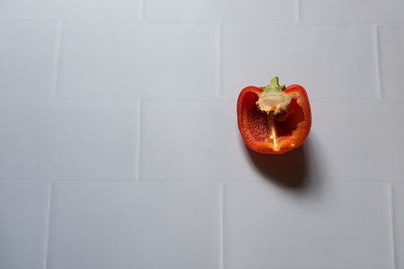 Top view of sliced red bell pepper on a background with use of selective focus