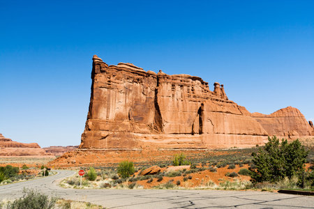 Desert road winds through Arches National Park near Moab Utahの写真素材