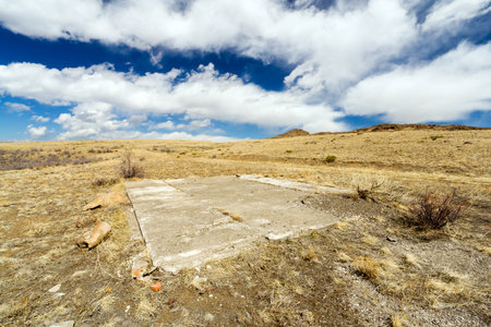 Desolate empty lot in a barren mountain fieldの写真素材