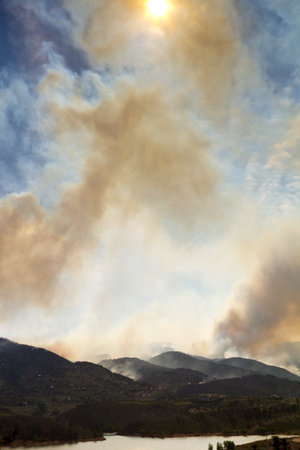 Wildfire burns a mountain landscape during the High Park Fire in northern Colorado June 2012の写真素材