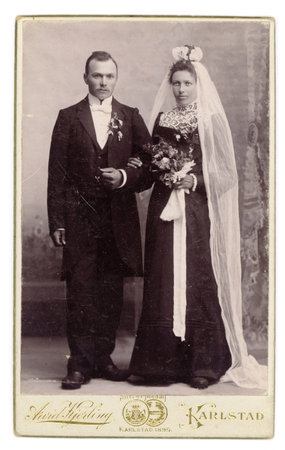 Antique 1895 Wedding Photo Bride in Black Dress   Groom in Tuxedoのeditorial素材