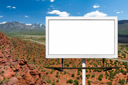 Blank billboard sign on empty highway road in the desertの写真素材