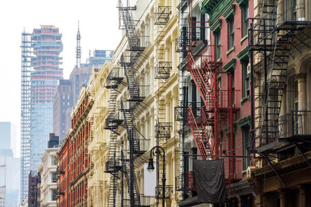 Long row of colorful buildings in the Soho neighborhood of Manhattan, New York Cityのeditorial素材