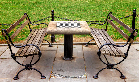 Chess table with empty benches in City Hall Park in Manhattan New York City NYCの写真素材