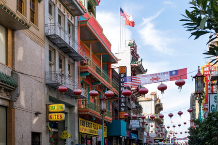 SAN FRANCISCO - CIRCA 2017: Colorful buildings and signs are crowded together along Grant Street in the the Chinatown neighborhood of San Francisco, California in the fall of 2017. This Chinatown neighborhood is one of the oldest in the United States.のeditorial素材
