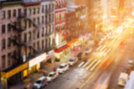 New York City abstract street scene with colorful blurred background and shining sunlightの写真素材