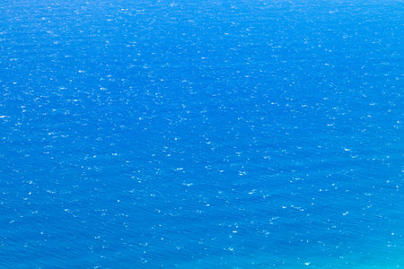 Overhead view of waves on an open blue ocean in the Pacific Oceanの写真素材