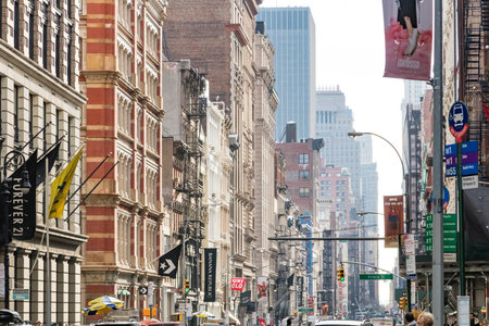 NEW YORK CITY, CIRCA 2018: The crowded sidewalks of Broadway and Prince Street are busy in the SOHO neighborhood of Manhattan NYC.のeditorial素材