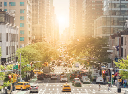 View of Second Avenue in New York city is crowded with cars and people in Manhattan with the bright...
