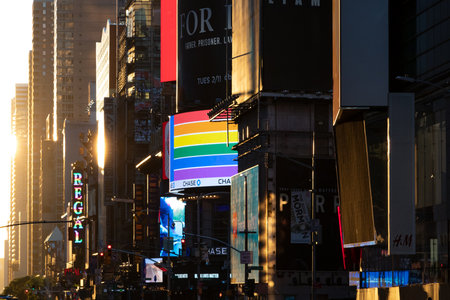 New York City, USA - June 14, 2020: Sunset light shines on the colorful signs and billboards at the...