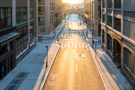 Empty streets and sidewalks of New York City with the light of sunset shining on the intersection of Pearl and Prospect Streets in Brooklynのeditorial素材