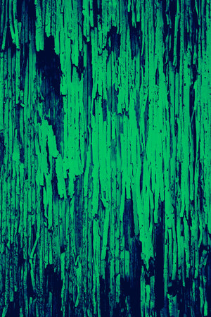 Peeling and cracked paint texture on an old wooden door with colorful green and blue duotone color...