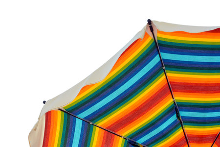 beach umbrella with rainbow colors, open to protect sunshineの写真素材