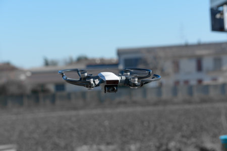 remote aerial quadcopter drone, with hight resolution camera, flying in the countryside, which makes a survey of the territory, Italyの写真素材