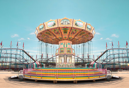 carousel with swings and rollercoaster in background at a fairの写真素材